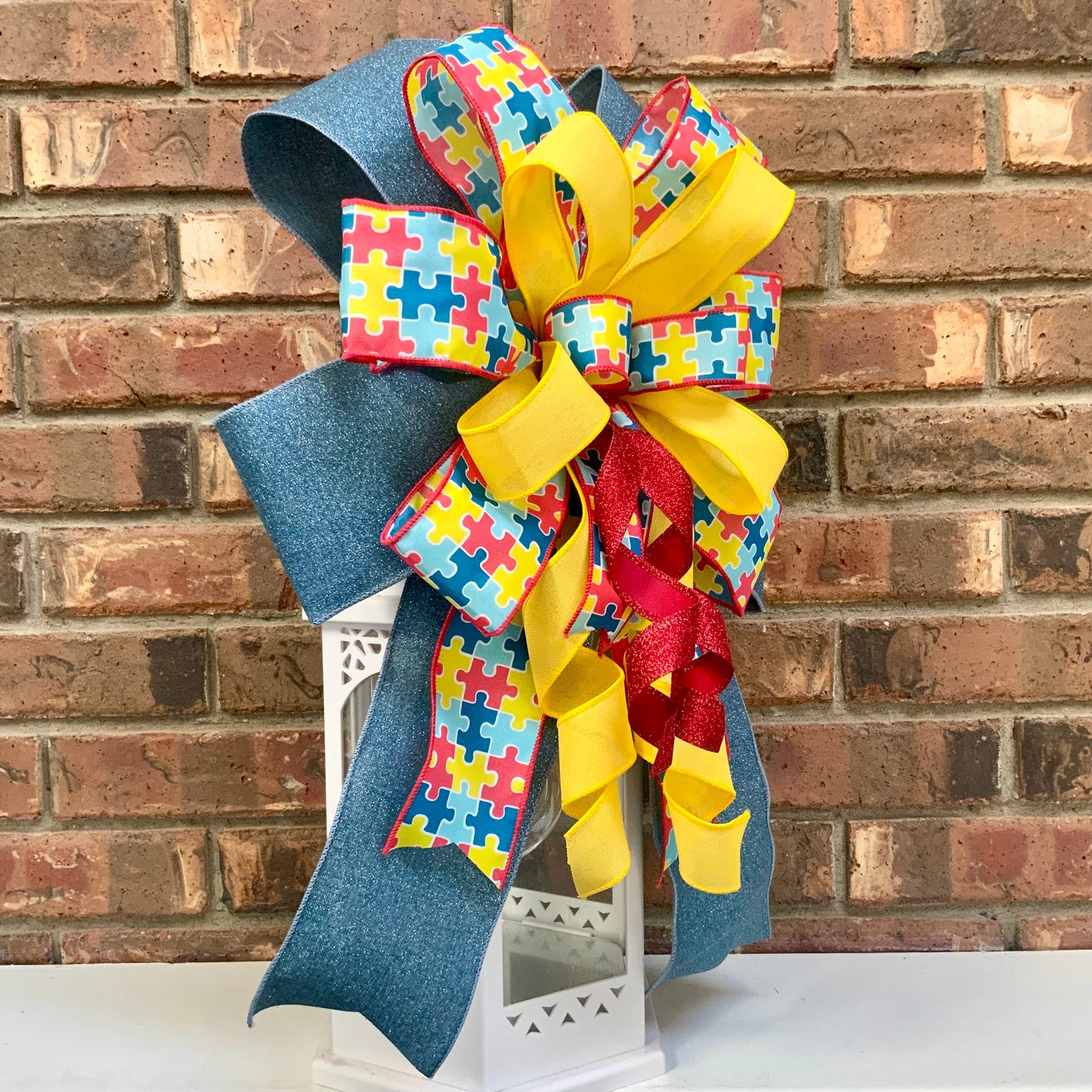Autism Awareness Bow - Puzzle Piece Lantern Bow | Blue Red Yellow Jigsaw Autism Support Decor Until All Pieces Fit