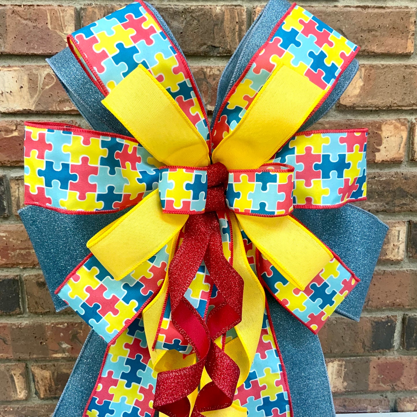 Autism Awareness Bow - Puzzle Piece Lantern Bow | Blue Red Yellow Jigsaw Autism Support Decor Until All Pieces Fit