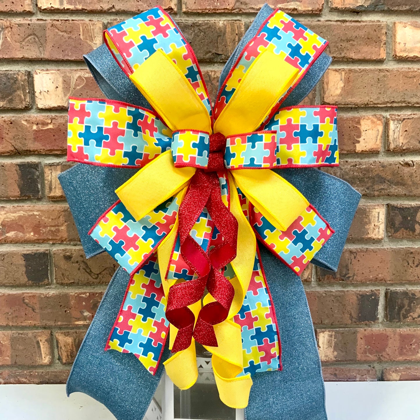 Autism Awareness Bow - Puzzle Piece Lantern Bow | Blue Red Yellow Jigsaw Autism Support Decor Until All Pieces Fit